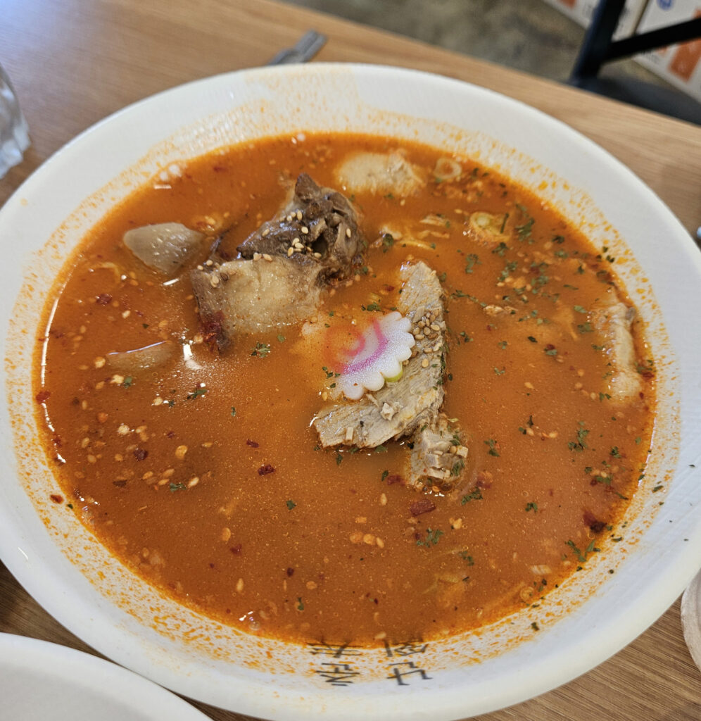 Spicy Jeju Black Pork Noodle Soup at Nanchun Restaurant